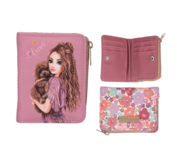 Monedero Floral de TOPModel con estampado de flores y modelo con perrito.