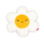 Almohada Super Soft Daisy de Legami sobre sofá blanco