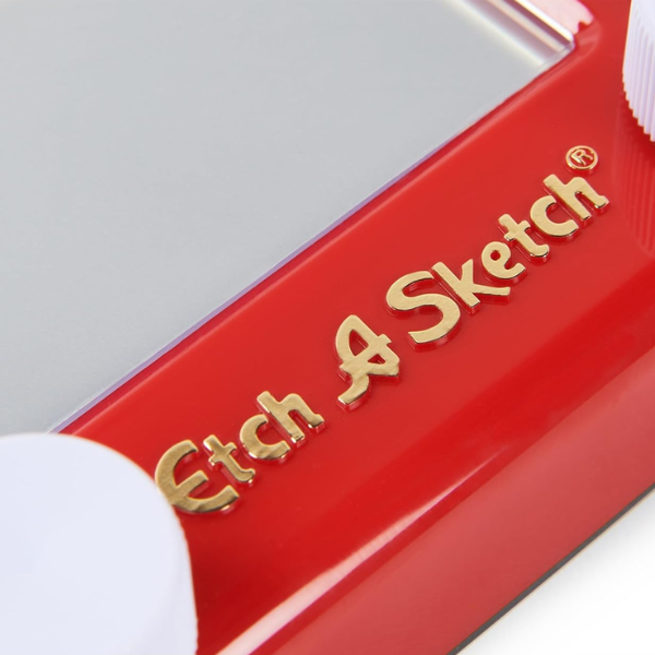 Etch A Sketch Mini Detalle de los mandos giratorios de la Etch A Sketch Mini.