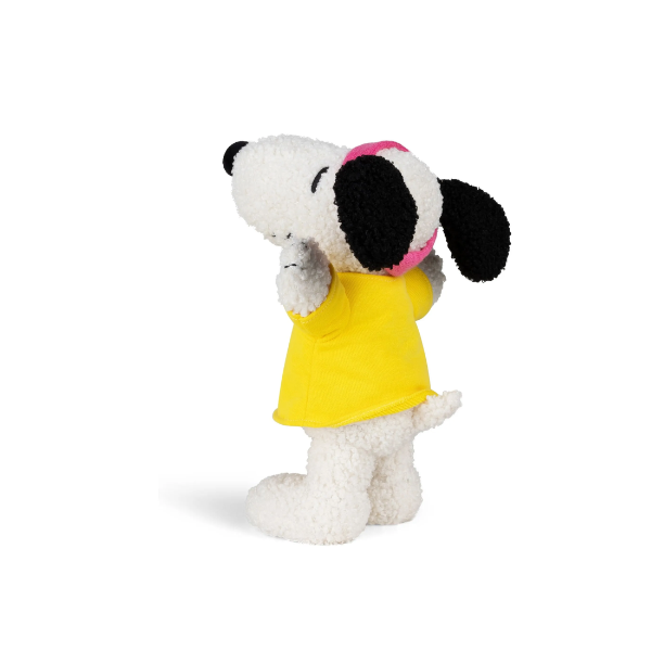 Peluche Snoopy Flashbeagle 24cm Snoopy Flashbeagle crema 24cm sentado sobre superficie blanca